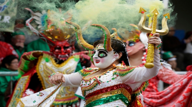 Members of the "Diablada" group perform during the Carnival parade in Oruro